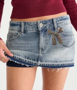 Déjà For Aero Bow Chain Low-Rise Micro Denim Skirt