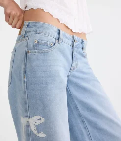 Super Low-Rise Ultra Wide Leg Eyelet Bow Jean