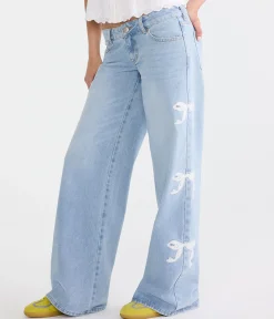 Super Low-Rise Ultra Wide Leg Eyelet Bow Jean